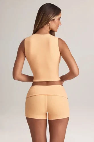 Shorts mi-hauteur à revers Nina en modal couleur pêche