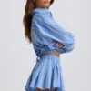 Shorts plissé en popeline de coton à rayures bleues