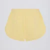 Shorts taille moyenne à boutons, couleur citron Shorts taille moyenne à boutons, couleur citron