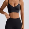 Soutien-gorge de sport à col en V Define Luxe en noir Soutien-gorge de sport à col en V Define Luxe en noir
