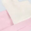 Soutien-gorge de sport contrasté en marl rose pâle Soutien-gorge de sport contrasté en marl rose pâle