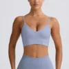 Soutien-gorge de sport Define Luxe à col en V, gris bleu Soutien-gorge de sport Define Luxe à col en V, gris bleu