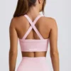 Soutien-gorge de sport sans coutures Super Sculpt à bretelles croisées dans le dos, couleur rose poudré Soutien-gorge de sport sans coutures Super Sculpt à bretelles croisées dans le dos, couleur rose poudré