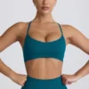 Soutien-gorge de sport sans coutures Super Sculpt à dos croisé, couleur bleu sarcelle Soutien-gorge de sport sans coutures Super Sculpt à dos croisé, couleur bleu sarcelle
