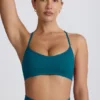 Soutien-gorge de sport sans coutures Super Sculpt à dos croisé, couleur bleu sarcelle Soutien-gorge de sport sans coutures Super Sculpt à dos croisé, couleur bleu sarcelle