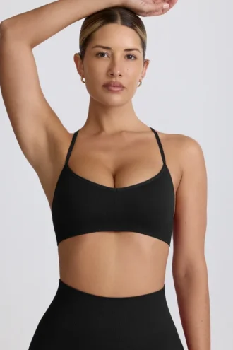 Soutien-gorge de sport sans coutures Super Sculpt à dos croisé, noir