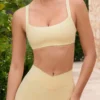 Soutien-gorge de sport Soft Active à coutures apparentes, couleur citron Soutien-gorge de sport Soft Active à coutures apparentes, couleur citron