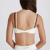 Soutien-gorge de sport Soft Active à dos torsadé et superpositions, couleur ivoire Soutien-gorge de sport Soft Active à dos torsadé et superpositions, couleur ivoire
