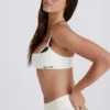 Soutien-gorge de sport Soft Active à dos torsadé et superpositions, couleur ivoire Soutien-gorge de sport Soft Active à dos torsadé et superpositions, couleur ivoire