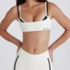 Soutien-gorge de sport Soft Active à dos torsadé et superpositions, couleur ivoire Soutien-gorge de sport Soft Active à dos torsadé et superpositions, couleur ivoire