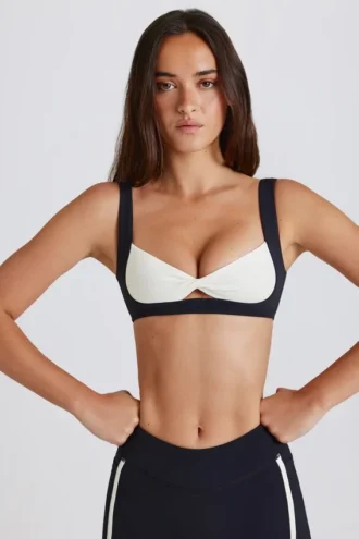 Soutien-gorge de sport Soft Active à effet torsadé sur le devant, noir