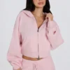 Sweat à capuche court zippé en maille douce, rose pâle