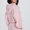 Sweat à capuche court zippé en maille douce, rose pâle