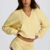Sweat à capuche en jersey de coton à col en V, couleur citron Sweat à capuche en jersey de coton à col en V, couleur citron