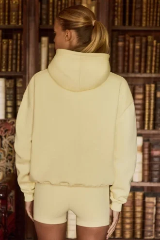 Sweat à capuche oversize brodé en jaune pâle