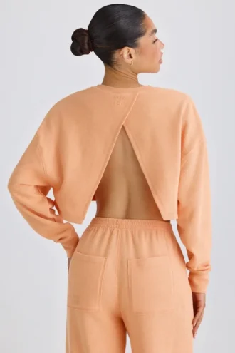 Sweat-shirt court à dos ouvert en jersey de coton texturé, couleur pêche