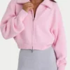 Sweat-shirt court zippé en maille côtelée, rose pâle Sweat-shirt court zippé en maille côtelée, rose pâle