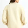 Sweat-shirt à fermeture éclair quart de longueur, couleur ivoire Sweat-shirt à fermeture éclair quart de longueur, couleur ivoire