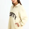 Sweat-shirt à fermeture éclair quart de longueur, couleur ivoire Sweat-shirt à fermeture éclair quart de longueur, couleur ivoire