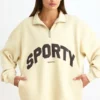 Sweat-shirt à fermeture éclair quart de longueur, couleur ivoire Sweat-shirt à fermeture éclair quart de longueur, couleur ivoire