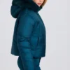 Veste de ski courte imperméable à capuche en fausse fourrure, couleur bleu sarcelle Veste de ski courte imperméable à capuche en fausse fourrure, couleur bleu sarcelle