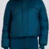 Veste de ski courte imperméable à capuche en fausse fourrure, couleur bleu sarcelle Veste de ski courte imperméable à capuche en fausse fourrure, couleur bleu sarcelle
