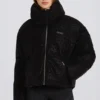 Veste de ski oversize courte imperméable, motif léopard noir Veste de ski oversize courte imperméable, motif léopard noir