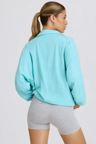 Veste de survêtement oversize en bleu aqua