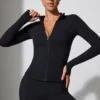 Veste zippée à manches longues en noir Veste zippée à manches longues en noir